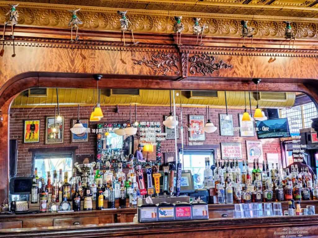 This handcrafted bar was saved and installed when the bar opended.