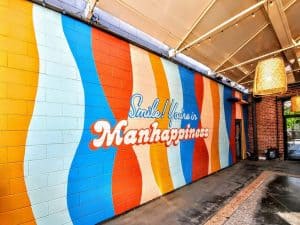 Smile you are in Manhappiness Mural at Public Hall