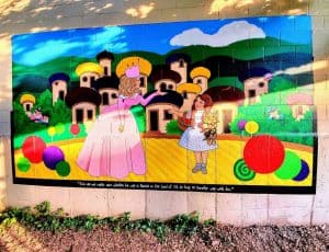 Mural of Glenda, Dorothy and Toto on the Yellow Brick Rd.