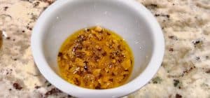 Bowl of chili oil with flakes.