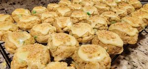 A rack of cookies sitting on top of a counter.