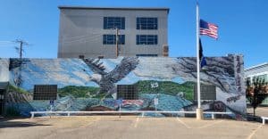 A mural of an eagle on the side of a building.