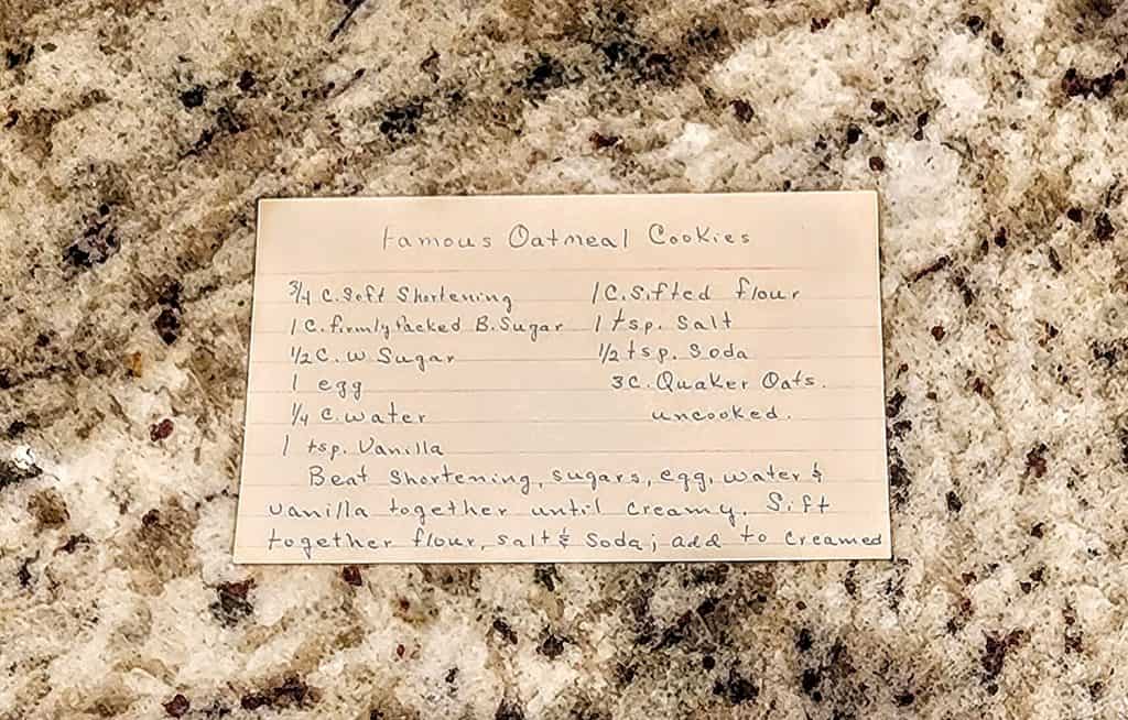 A handwritten note on a granite countertop.