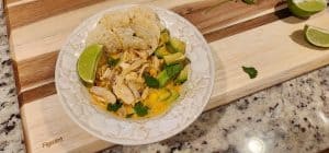 Chicken soup with avocado and lime.