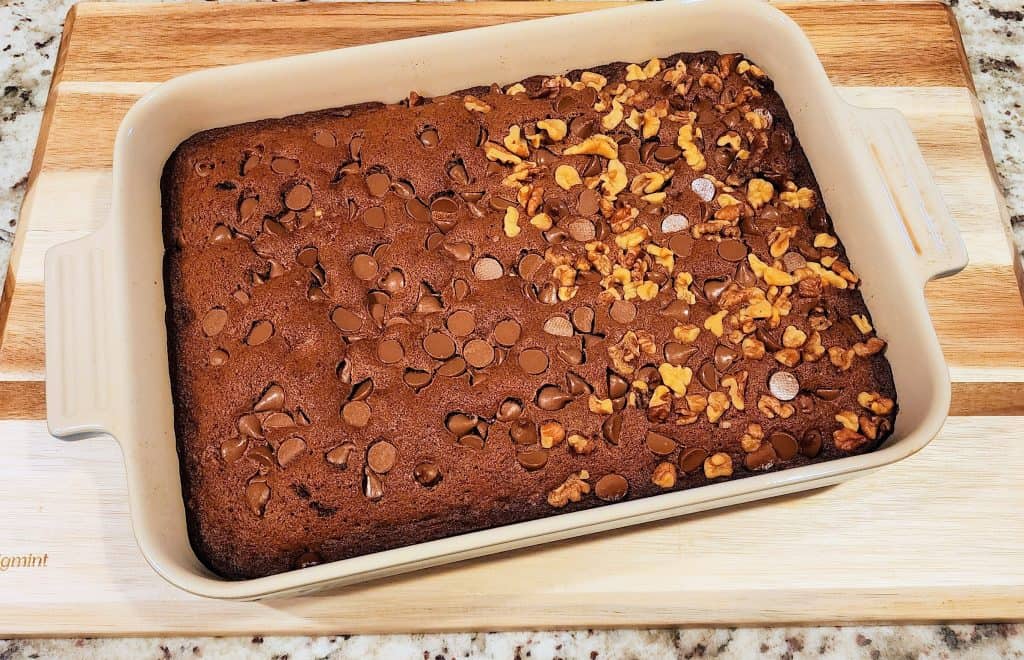 Chocolate chip walnut brownie in baking dish.