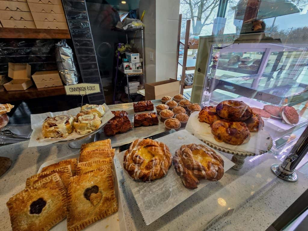 A Manhattan bakery nestled at Parkside Station, offering a delectable variety of pastries on display.