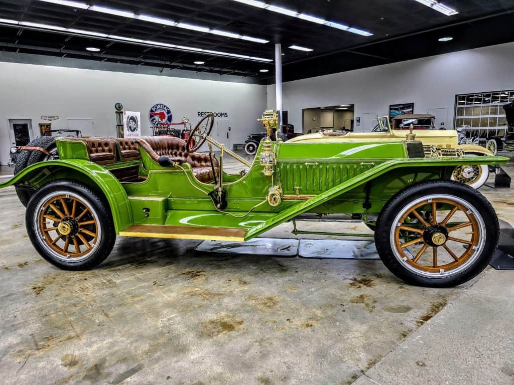 A green car at a car museum in Manhattan, KS.