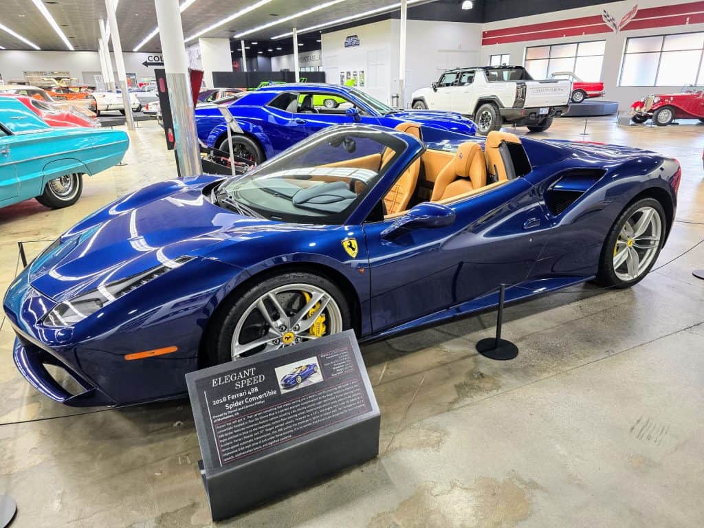A blue sports car on display at a car museum in Manhattan, KS.